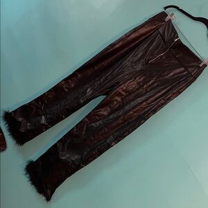 Elegant Black Leather pants with trim fur in the leg